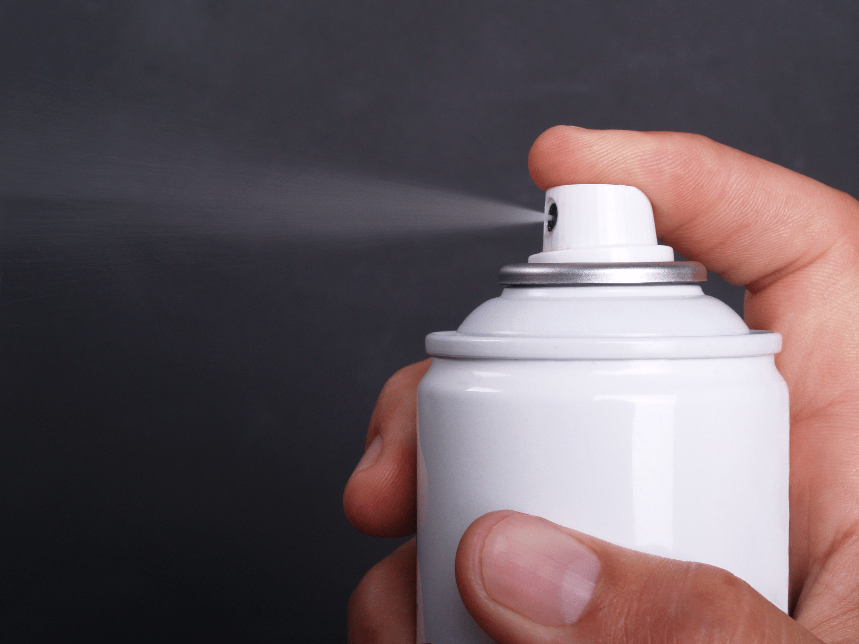 an aerosol cleaner being sprayed to make a school a clean environment 